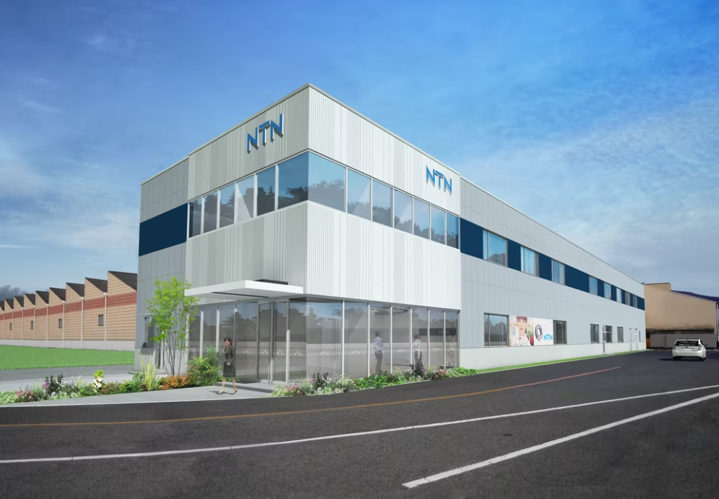 Contemporary commercial exterior with bold facade design, structured elevation, glass panels, and modern architectural detailing